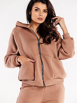 Bluză Infinite You  Hanorac cu mâneci lungi, cu glugă și închidere cu fermoar. Cusături decorative pe partea din față și buzunare mari.