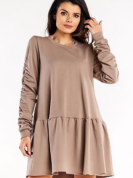 Rochie de zi Infinite You  Rochie lejeră, cu mâneci lungi, decolteu rotund și tiv cu volane. Mâneci cu pliuri decorative.