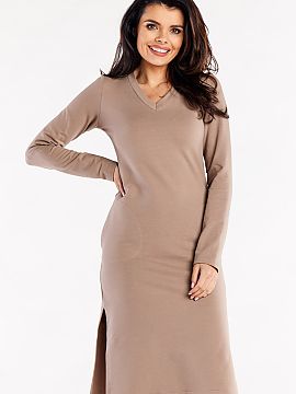 Rochie de zi Infinite You  Rochie mulată, cu mâneci lungi și fante pe laterale. Rochia are un decolteu în V și buzunare decorative aplicate.