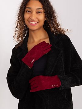 Mănuşi AT  Mănuși elegante pentru femei din material cu model geometric decorativ. Butoane decorative acoperite la încheieturi. Degetul arătător c