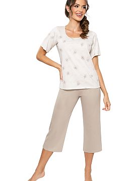 Pijama Donna  Pijama elegantă și confortabilă pentru femei, perfectă pentru nopțile liniștite și seriile relaxante. Setul este format dintr-o bluz�