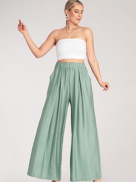 Pantaloni de damă Figl  Pantaloni largi cu buzunare laterale, fabricati dintr-un material usor si respirabil. Model cu talie inalta si elastic in talie.