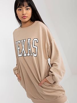 Bluza Ex Moda  Un pulover lung casual pentru femei este o propunere ideală pentru zilele obișnuite, confortabilă, practică și stilată. Realizat dintr