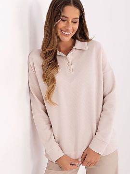 Bluzka Lakerta  Această bluză de damă de tip polo este combinația ideală între stilul clasic și confortul zilnic. Confecționată dintr-o amestec pl