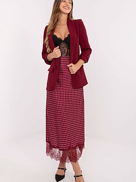 spódnica Rue Paris  Fustă midi elegantă și feminină, confecționată dintr-un material plăcut la atingere, poliester cu adaos de elastan, care asigură con