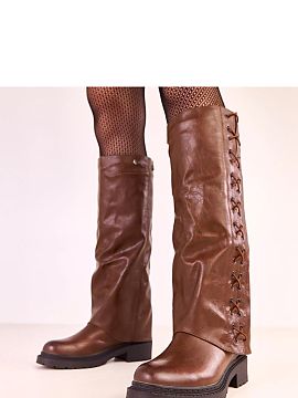 Cizme Solea  Bocanci moderni și funcționali cu partea superioară a gambei detașabilă, care permit crearea a două stiluri diferite într-un singur m