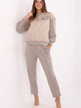 Completă Italy Moda  Elegantul și extrem de confortabilul set casual pentru femei, care se potrivește perfect pentru purtarea zilnică. Realizat dintr-o ameste