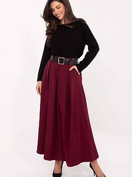 Fustă lungă Italy Moda  Fusta lungă elegantă și feminină, cloșată maxi cu volane în față, care combină confortul purtării cu un stil clasic potrivit atâ