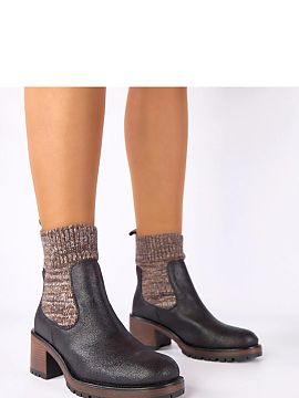 Botine cu toc Solea  Botine negre cu toc și gambă șosetă Lisa de la marca Gemre reprezintă alegerea perfectă pentru femeile care apreciază combinația de 