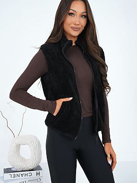 Vestă Factory Price  Vesta elegantă de damă cu caracter casual, ideală pentru zi de zi. Realizată dintr-un material moale și blănos cu predominanță de po