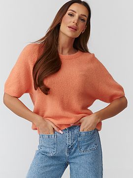 Pulover cu mânecă scurtă Makadamia  Un pulover elegant pentru femei, de dimensiune universală, cu croială lejeră oversize, perfect pentru ținutele de zi cu zi și cele eleg