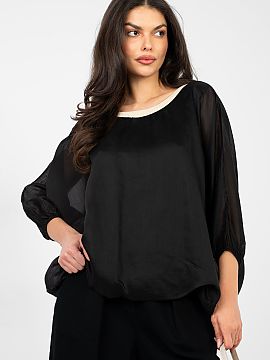 Bluzka Italy Moda  O bluză elegantă de lungime standard, ideală pentru muncă și ocazii speciale, combinând un aspect elegant cu confortul purtării. Mode