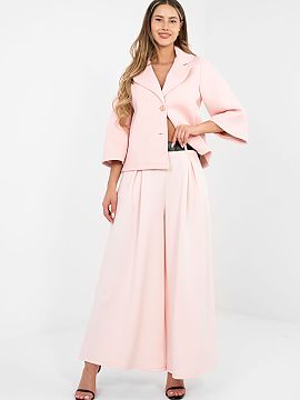 Pantaloni de trening Rue Paris  Elegantul pantaloni de trening tip palazzo reprezintă o combinație perfectă între confort și eleganță într-o abordare modernă. Real