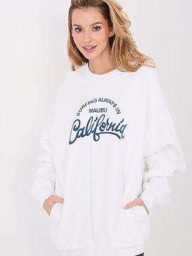 Bluză Factory Price  Bluza elegantă de damă cu croi alungit este o propunere ideală pentru femeile care apreciază confortul și aspectul modern. Inscripțiil
