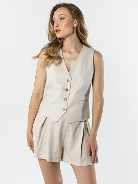 Vestă awama  Elegantă vestă de in cu croială feminină, perfectă pentru a completa ținutele de vară. Modelul cu decolteu în formă de V subțiază