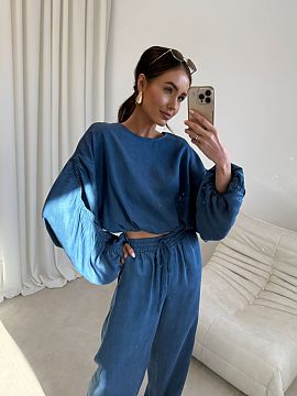 Bluzka Roco Fashion  Bluza lejeră, cu un design modern, ușor scurtat, impresionează prin materialul moale și pliurile largi ale mânecilor. Croiala confortab