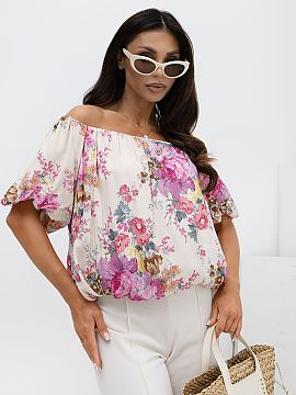 Bluză Italy Moda  Elegantna bluză damă cu imprimeu floral este o propunere stilată pentru zi de zi, la birou și pentru ocazii speciale. Realizată dintr-o