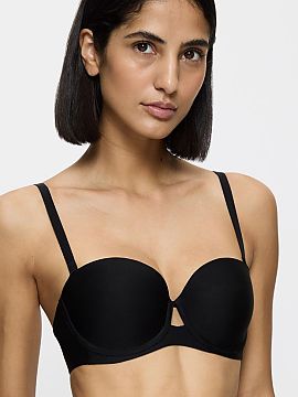 Sutien întărit Triumph  Sutien cu burete Pure Micro WDP 10217872 în culoarea neagră este un model universal, care oferă susținere excelentă și modelare natura