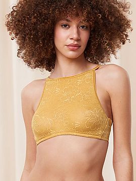 Soft Triumph  Triumph sutien moale soft Amourette Charm Shimmer Bustier 10215986 este realizat din dantelă elastică cu motive florale. Sutienul fără a