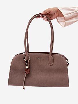 Poşetă de zi Step in style  Geantă de damă din imitație de catifea este un accesoriu elegant și practic, care completează perfect ținutele zilnice. Modelul se în