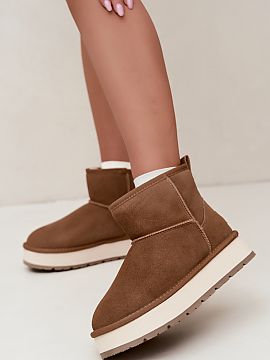 Moon boots Step in style  Subliniază stilul de iarnă cu ghetele de zăpadă din catifea de la brandul Big Star. Modelul realizat din piele de catifea arată spectac