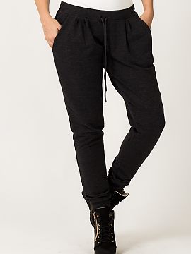 Pantaloni de trening Tessita  Pantaloni de trening confecționați din țesătură de trening tricotată, de culoare gri închis, finisată cu o nervură largă în parte