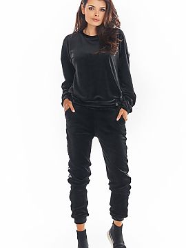 Pantaloni de trening awama  Pantaloni din velur cu cordon la picioare și buzunare frontale. Bandă decorativă cu logo-ul mărcii noastre. Trebuie să aibă în acest 