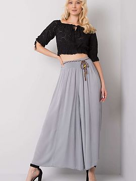 Pantaloni de damă Och Bella  Pantaloni cu talie înaltă din viscoză, cu talie elastică. Pantaloni cu picioare largi, curea decorativă cu cravată.