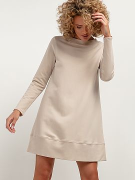 Rochie de zi Tessita  Rochia tricotată până la genunchi, cu croială trapez, este o opțiune excelentă pentru sezonul de toamnă. Finisajele îngrijite, decol